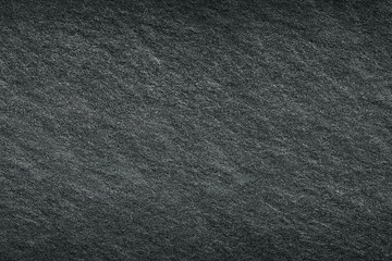 Dark gray abstract black slate stone background or texture.