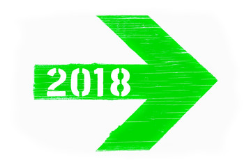 Bright green directional arrow manually painted on wooden signboard texture and isolated on a white background with the inscription for year 2018 in white numerals.