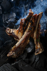 Lamb ribs on the coals. Rack of lamb