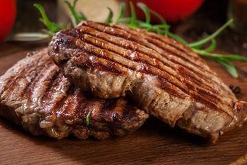 Succulent portions of grilled fillet mignon served with rosemary