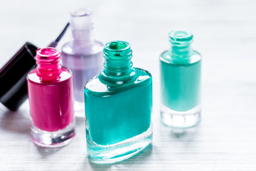 set for nail polish on white table background