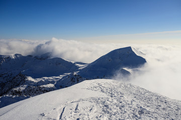 Fototapeta na wymiar panorama invernale dalla cima di Piazzo. Sullo sfondo il monte Sodadura - Alpi Orobie
