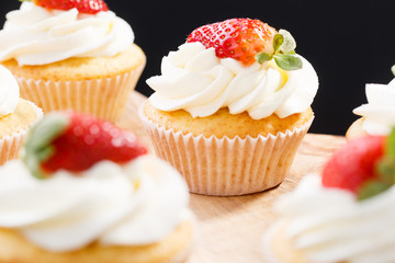 strawberry capcake in a cardboard box