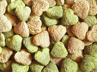 Homemade cookies in the form of heart. Food for Valentine's Day. Top view. Pastry with nuts, biscuit, cracker