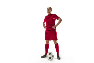 Naklejka na ściany i meble Professional football soccer player with ball isolated white background