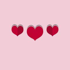 Two-colored hearts for Valentine's Day on a pink background