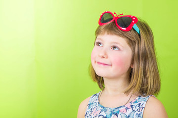 smiling girl with butterfly sunglasses