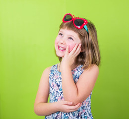 smiling girl with butterfly sunglasses