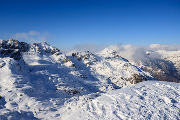 Fototapeta na wymiar panorama invernale dalla cima di Piazzo - Alpi Orobie