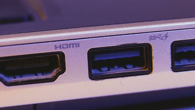 Closeup of HDMI and USB ports in a laptop