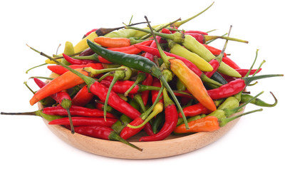 Different colors chilli peppers isolated on white background.