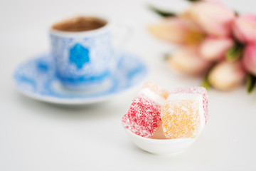 Turkish delight close up background with Turkish coffee