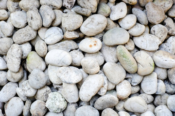 Natural abstract smooth round pebbles sea texture background