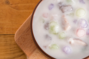 Thailand dessert, Bua Loy in cup on wooden.

