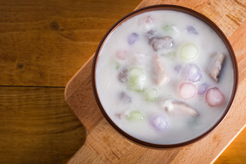 Thailand dessert, Bua Loy in cup on wooden.

