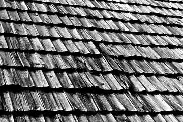 Old wooden roof texture in black and white.