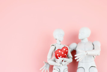 Red heart in love Couple hug figure on Pink background