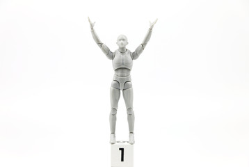 Winner Business concept:figure Action one podium on White background