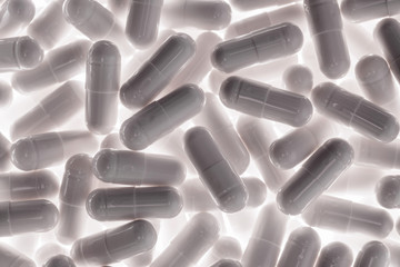 White pills capsules. Medicine and pharmacy concept.