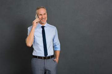 Senior man talking over phone