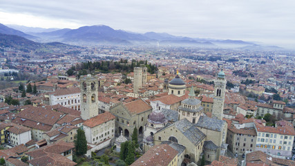 Fototapeta na wymiar Aerial video shooting with drone on Bergamo, famous and ancient Lombardia city, founded on the hills