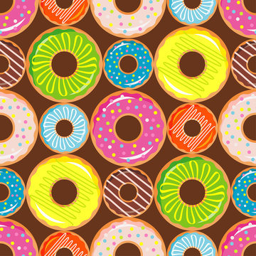 Seamless pattern with colorful donuts with glaze and sprinkles. Colorful collection of cartoon dessert. Textile rapport.