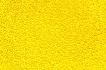 Fototapeta premium golden liquid soap bubbles as background