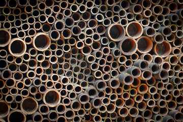 Dark Wall Earthen Elements Associated Cement Mortar Background.Modern Wall Texture Detail.Layered Building Wall.Natural Material Burnt Brick Background.Texture Burnt Clay.Wall Alternative Material