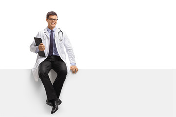Doctor with a clipboard sitting on a panel