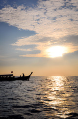 Fishermen at sunset in Ko Phi Phi