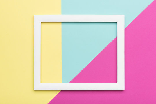 Abstract pastel colored paper texture minimalism background. Minimal geometric shapes and lines composition with empty picture frame.