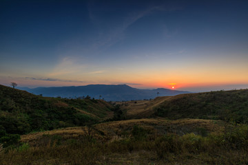 Beautiful sunset on the high mountain in Loei province, Thailand.