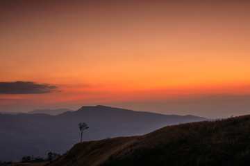 Beautiful sunset on the high mountain in Loei province, Thailand.