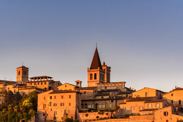 Fototapeta premium View of the medieval town of Spello in Umbria, Italy at sunset