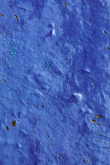 Natural abstract texture colored background with cracks and scratches. Old paint destroyed by water and time. Bright color surface.