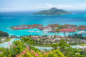 Red roofs of Eden Island, aerial view of Seychelles - obrazy, fototapety, plakaty