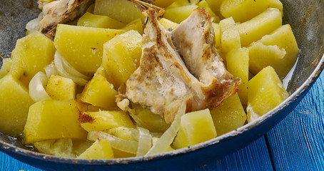Rustic baked chicken with potatoes