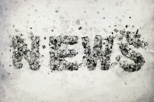 the word NEWS made from nespaper confetti
