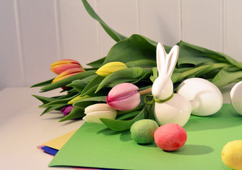 Fototapeta na wymiar Easter concept, spring tulips and porcelain bunny