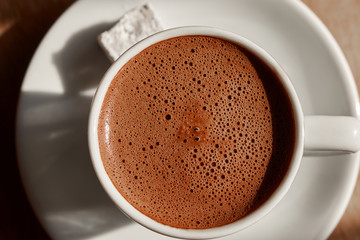 a cup of turkish coffee with foam
