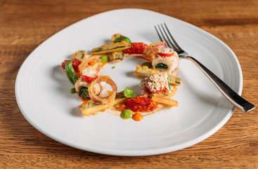 Seared fish, fried onions and tomato chutni