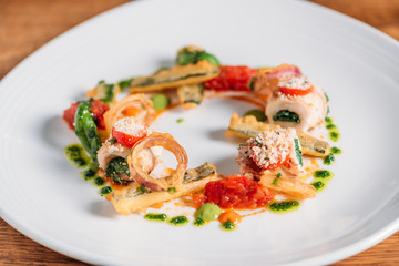 Seared fish, fried onions and tomato chutni