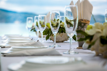 Table setting for an event party or wedding reception at the beach