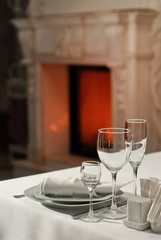 Glass dishes on a table on a white tablecloth