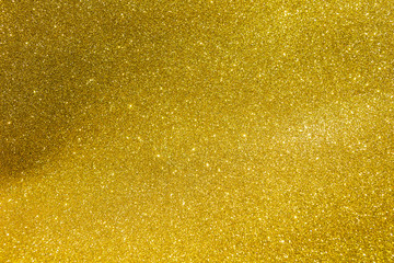Abstract shiny gold glitter texture background