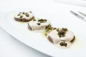 Sliced veal with sauce