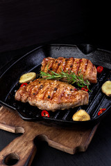 Grilled pork steak in grill pan