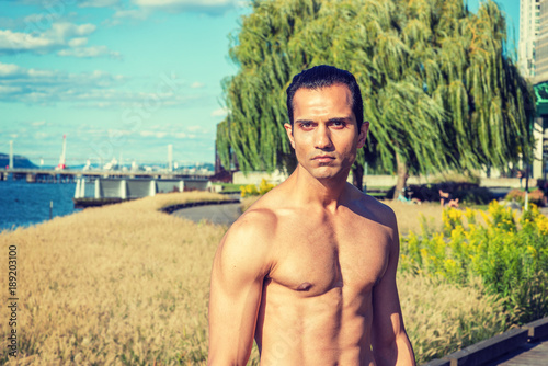 500px x 334px - Young East Indian American Man, half naked, showing strong ...