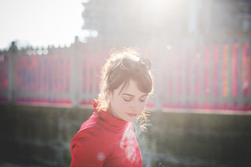 young beautiful red dressed vintage hipster woman