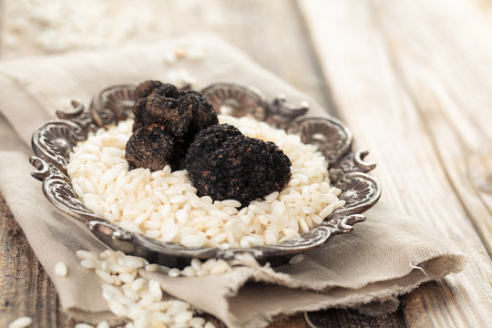 Black truffles and white rice.